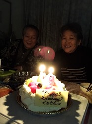 両親と…